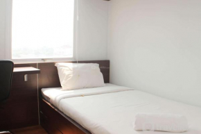 Homey and Minimalist 2BR at Patraland Urbano Apartment By Travelio